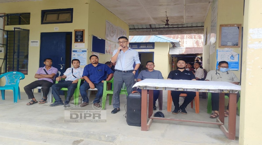 SDC (Civil) Tizit, Tumben P Tsanglao, addressing the gathering during a free multi-specialty health camp organised by the Tizit Town Council under 15th Finance Commission Health Grants, held at PHC Tizit on June 12. (DIPR Photo)